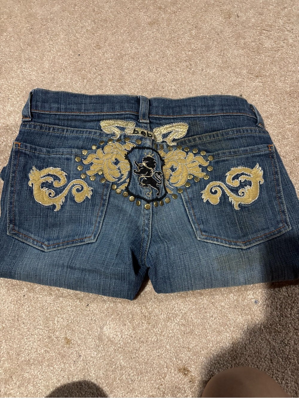bebe Dark Blue Denim Shorts with Pink Logo and Gold Stitching